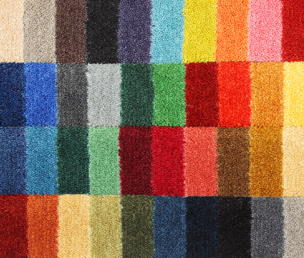 Many swatches of different carpet colors