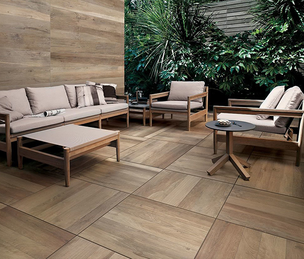 Large square wood look tile flooring in sitting area