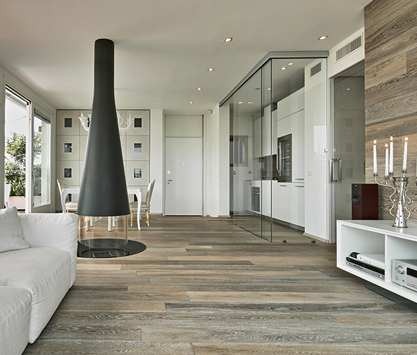 Modern living space with gray tone hardwood flooring