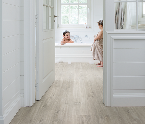 Bathroom with water resistant laminate flooring